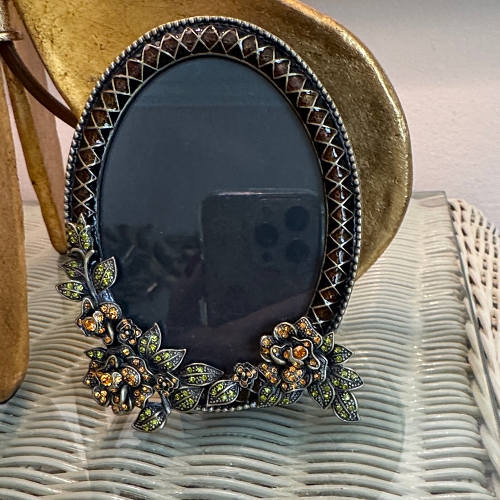 Oval crystal embellished and enamel picture frame.